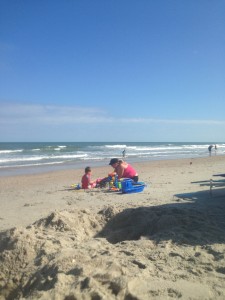 Nicole and Colton playing in the sand