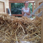 Natalie mucking out the coop