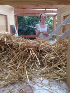 Natalie mucking out the coop